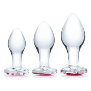 Three glass plugs in different sizes