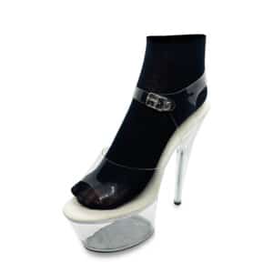 Transparent high-heeled shoe with black sock inside.